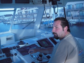 John at the helm of his Clam Dealer