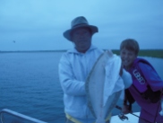 Wayne and Jon with a 7 pound back bay flounder